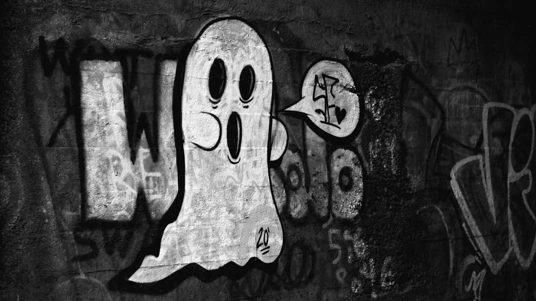 a black and white photo of a ghost on a wall — Foto por Kyle Larivee na Unsplash