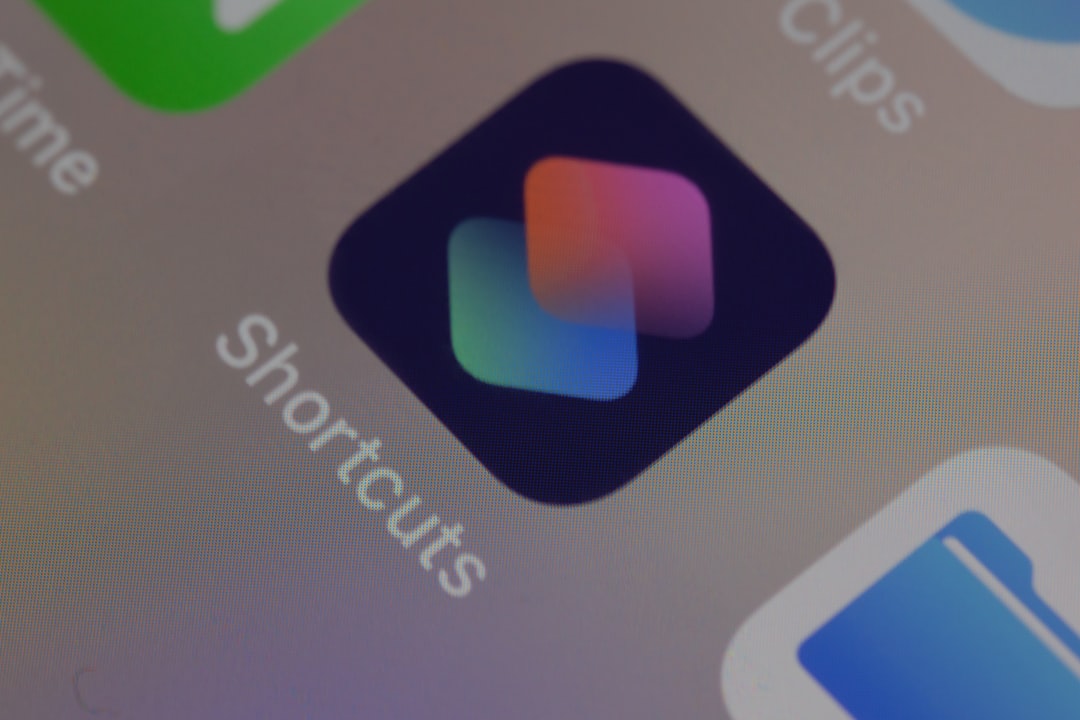 blue and green logo on computer screen — Foto por Dimitri Karastelev na Unsplash