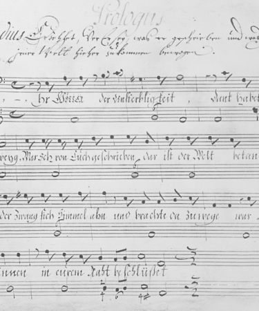 Handwritten musical score with lyrics — Foto por Europeana na Unsplash