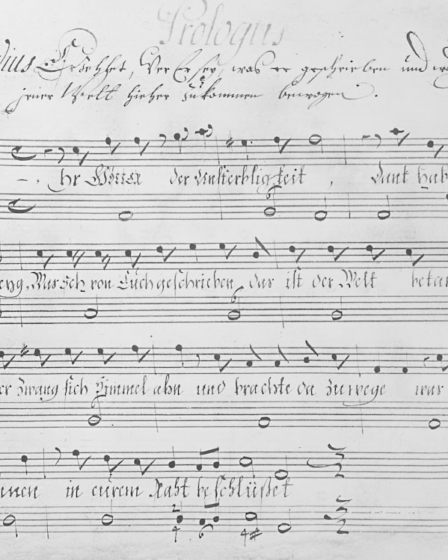 Handwritten musical score with lyrics — Foto por Europeana na Unsplash