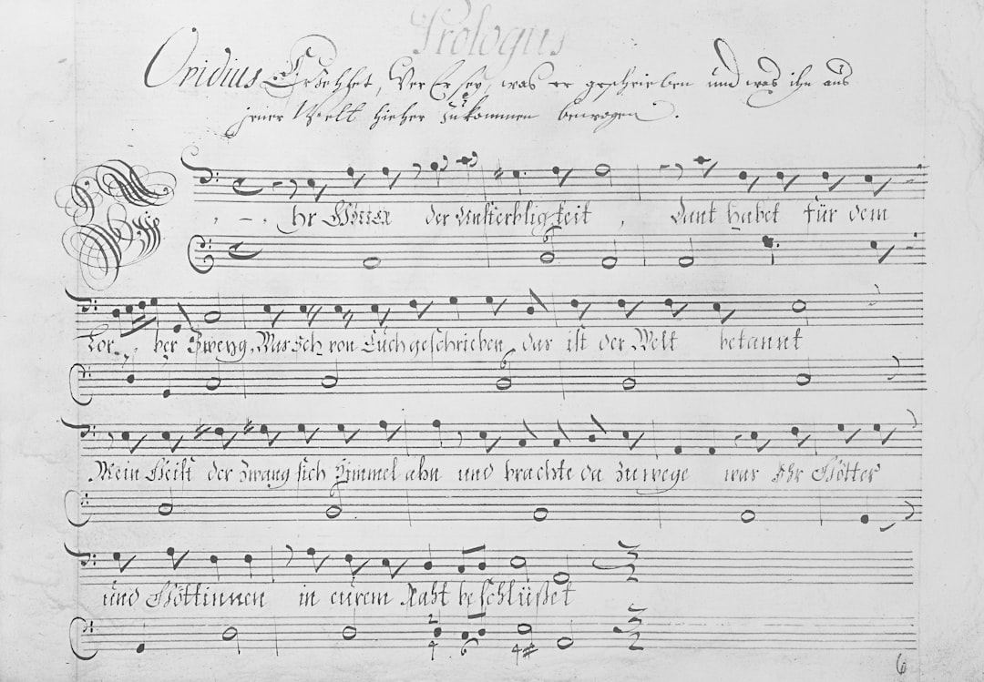 Handwritten musical score with lyrics — Foto por Europeana na Unsplash