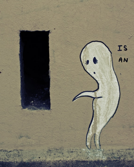 a drawing of a ghost is painted on the side of a building — Foto por Bertrand Colombo na Unsplash